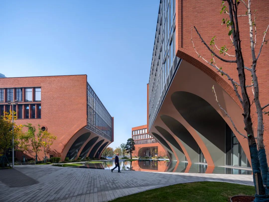 Artistically integrated terracotta jali adding cultural depth to BASIS Wuhan School.