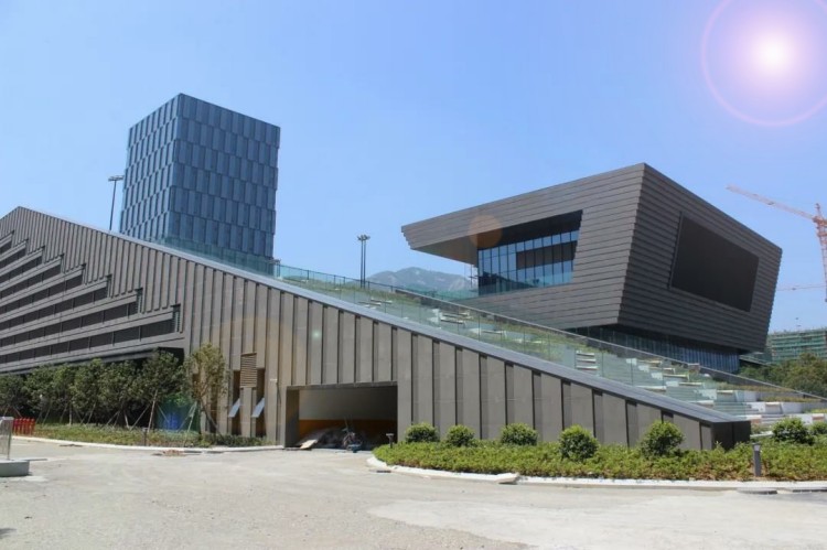 Facade of Singapore Xingyao Cultural Center featuring Terracotta Panels and Louvers for shading and energy efficiency.